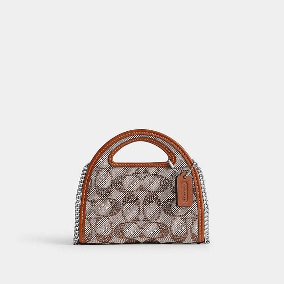 Coach Handbags - Top Handle Card Case
In Crystal Signature Jacquard NWT
Coach